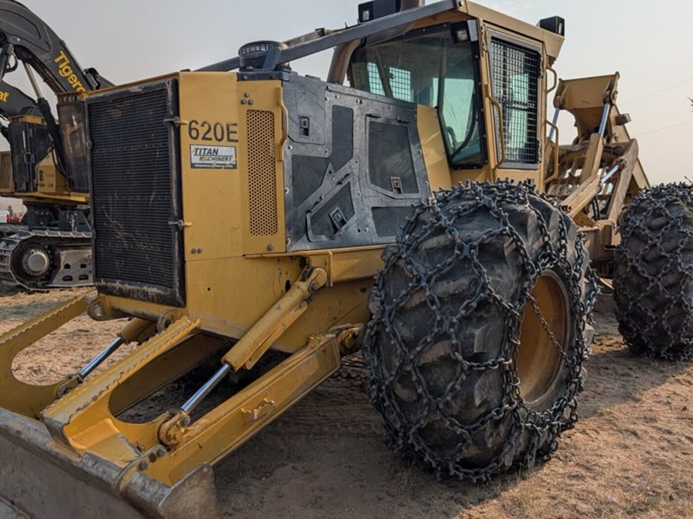 Tigercat 620E working alongside the rest of the forestry fleet at sunset